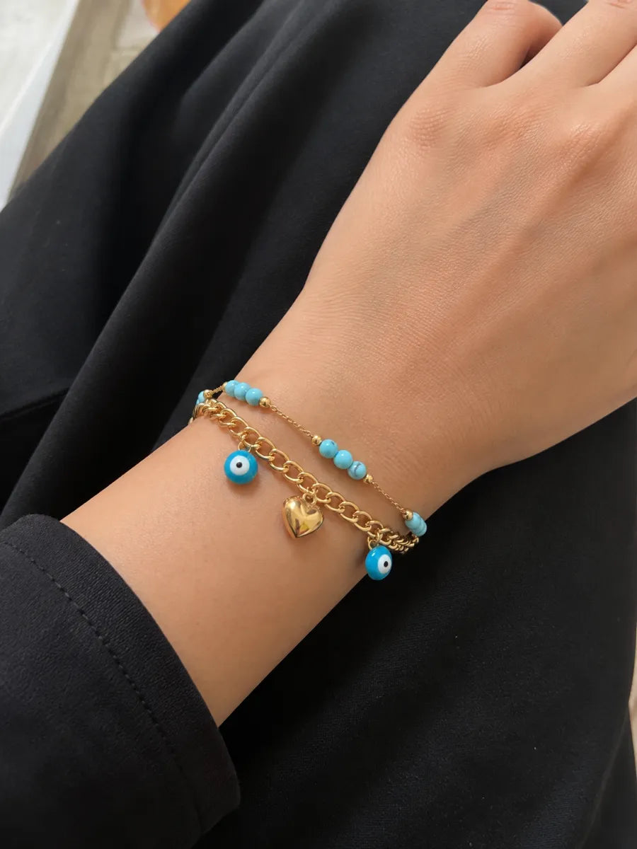 Layered evil eye chain bracelet