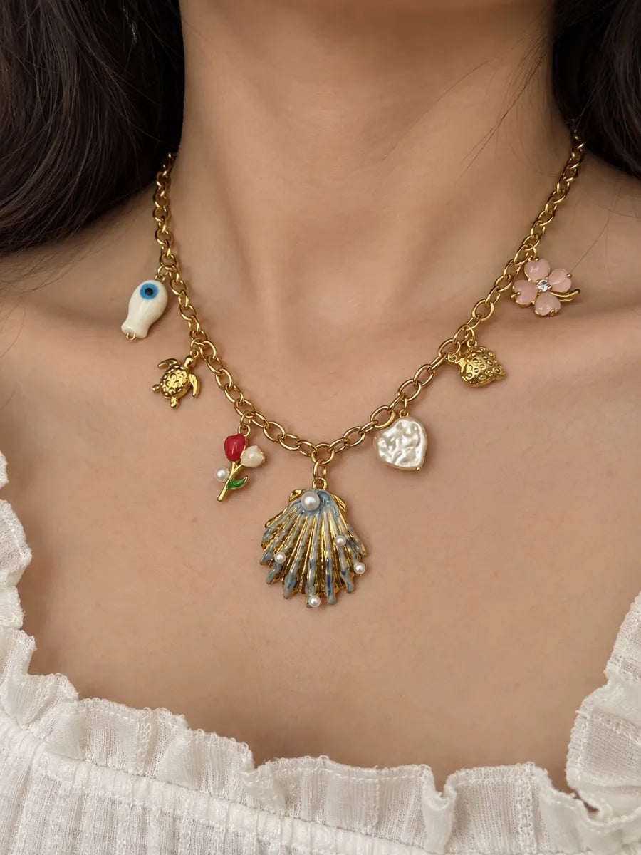 Shell with evil eye charm necklace